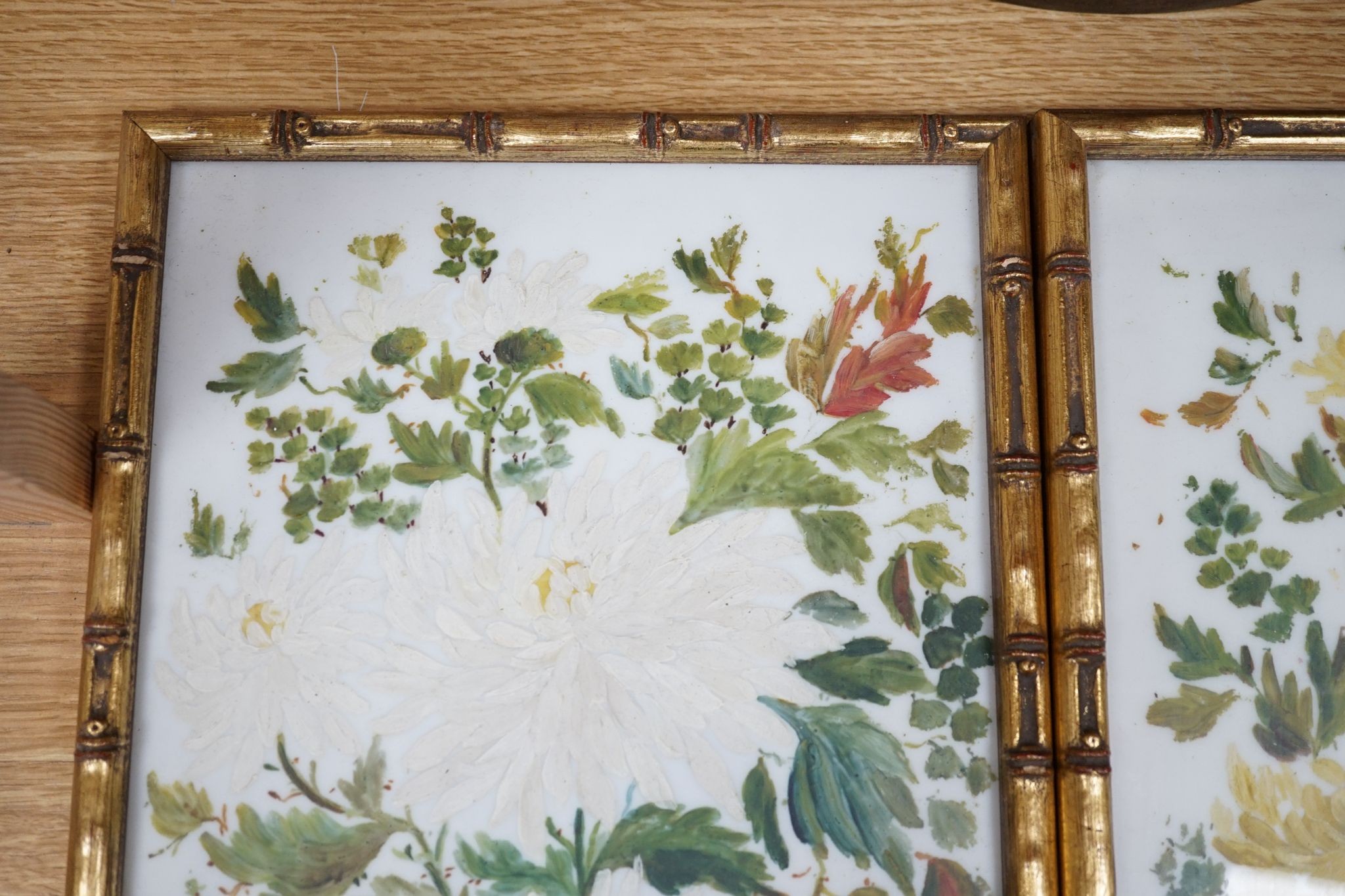 A pair of framed floral painted porcelain plaques signed F. Perrin, 41x19cm excl frames